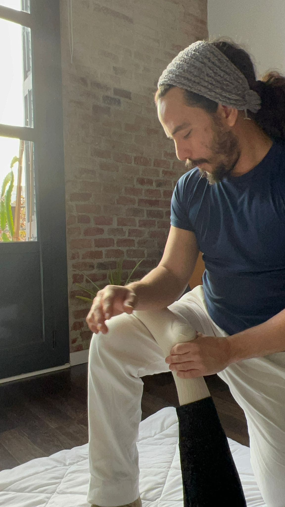 Denis giving massage | In Home Massage Tampa | Tampa Mobile Massage | Breathe In Massage | Traditional Thai Massage Tampa | Breathe In Massage | About Breathe In Massage | Denis Puebla Licensed Massage Therapist