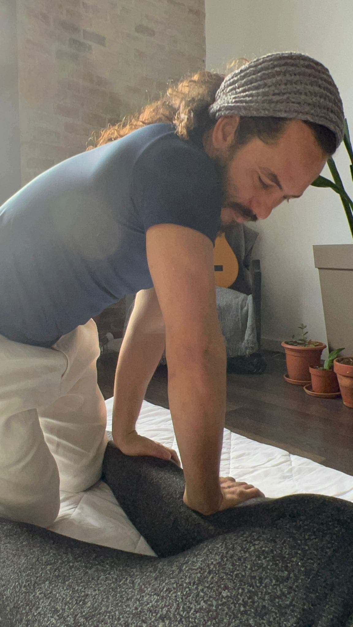 Denis giving massage | In Home Massage Tampa | Tampa Mobile Massage | Breathe In Massage | Traditional Thai Massage Tampa | Breathe In Massage | About Breathe In Massage | Denis Puebla Licensed Massage Therapist