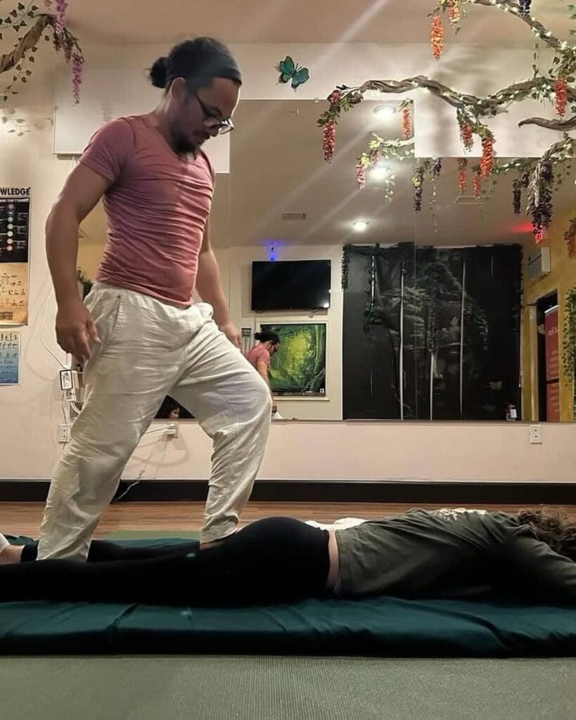 Using feet during a deep tissue massage | About Breathe In Massage | Denis Puebla Licensed Massage Therapist